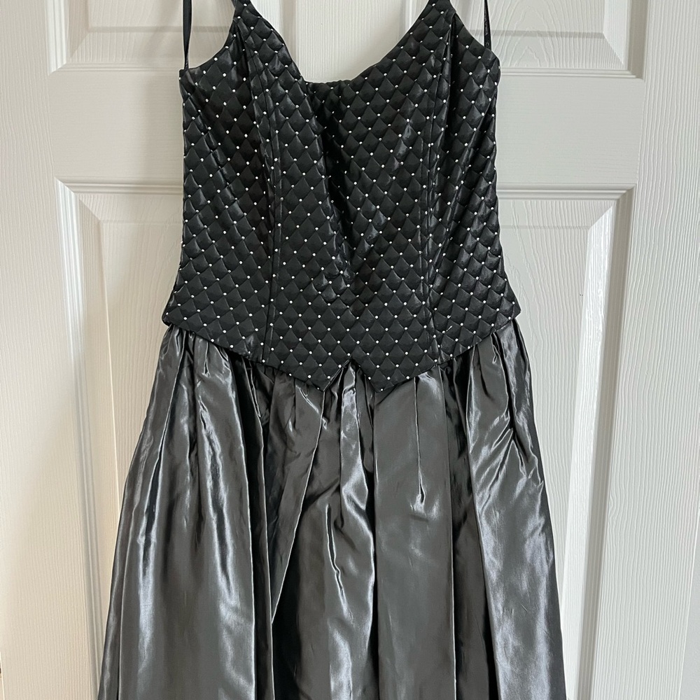 Formal full length gown, with corset style top and full skirt.